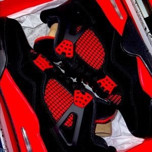 Red Thunder Jordan 4’s